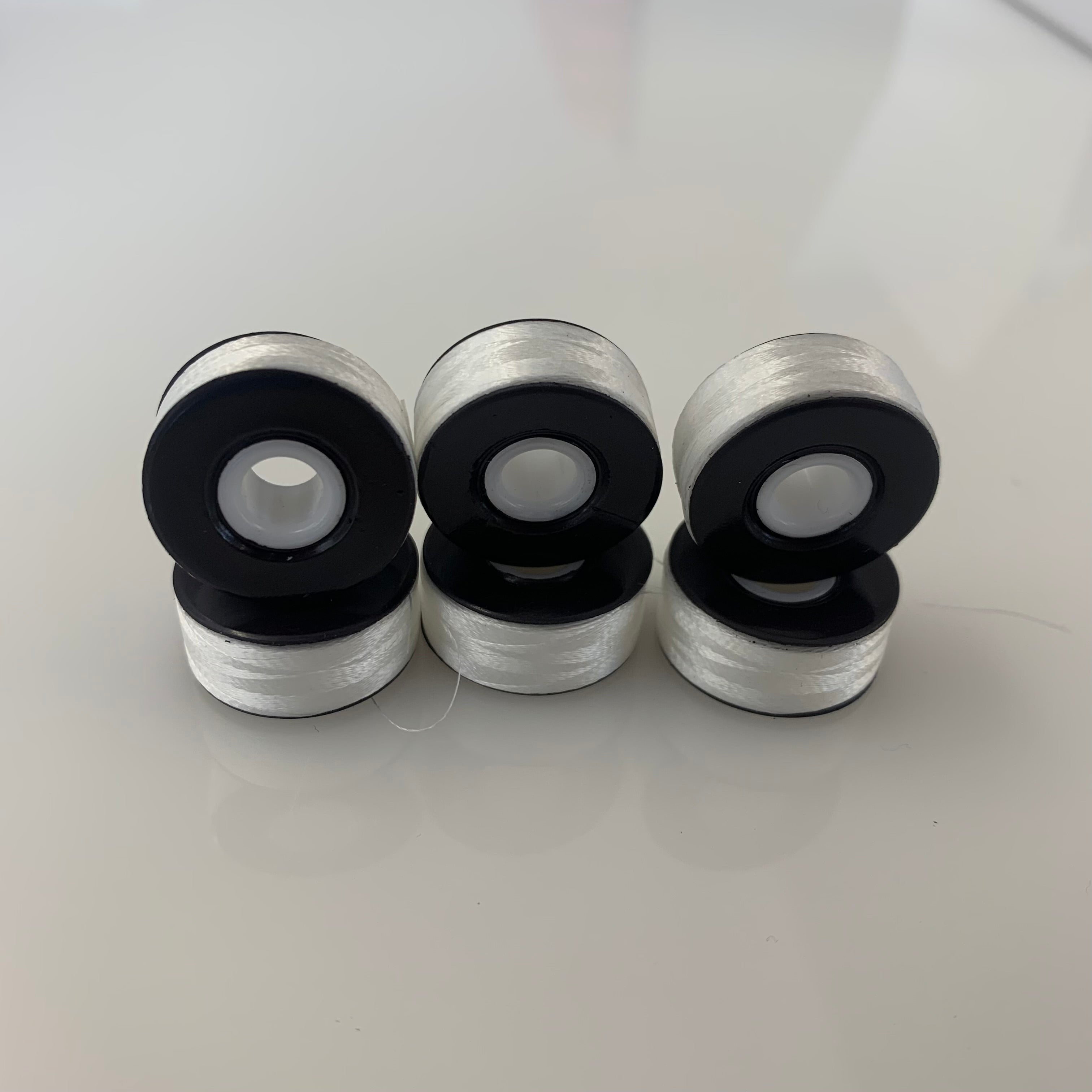 Magnetic sided pre wound Polyester Bobbins