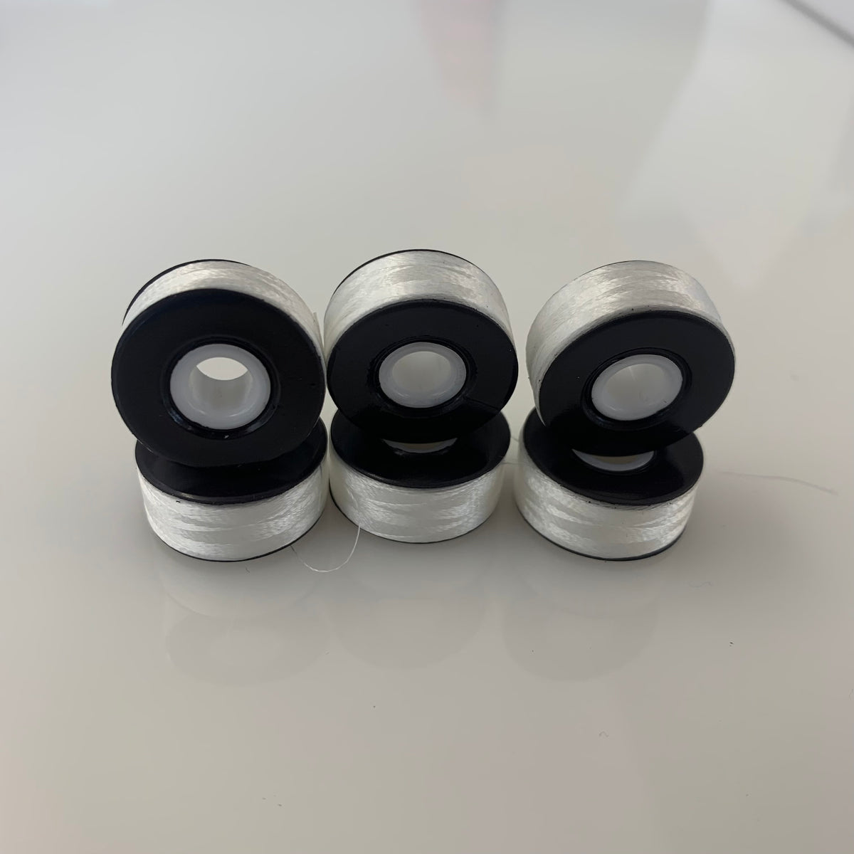 Magnetic sided pre wound Polyester Bobbins