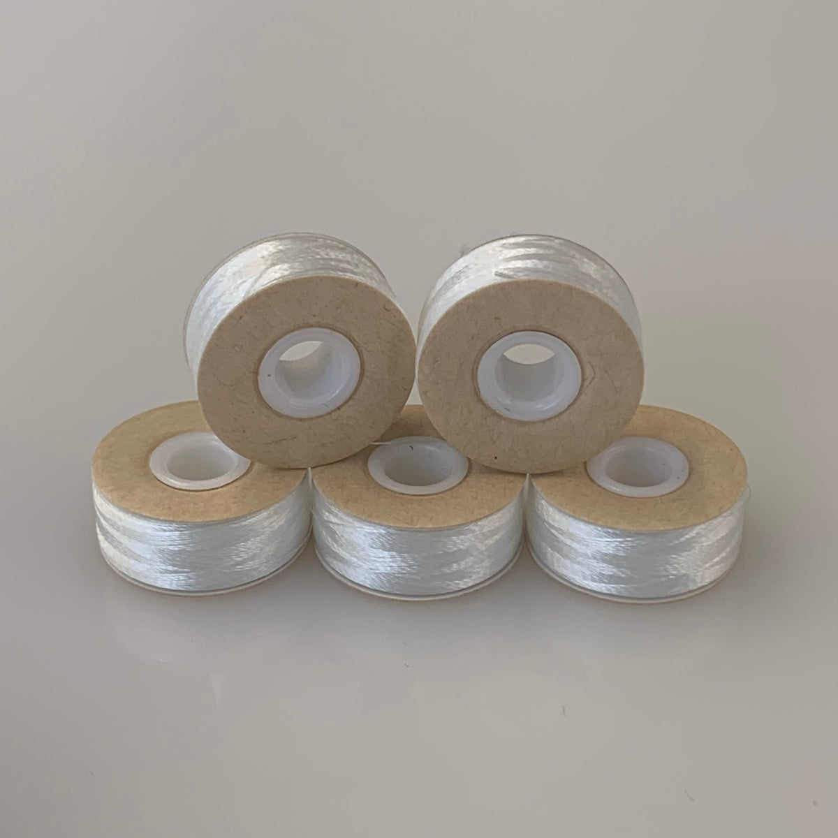 Card sided pre wound Polyester Bobbins